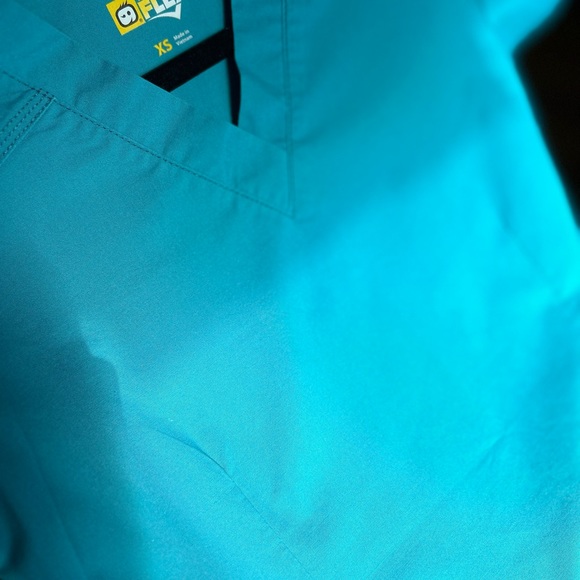 Two sets of Women’s Scrubs in Gray and Pink. Extra women’s scrub top included! - Picture 12 of 12